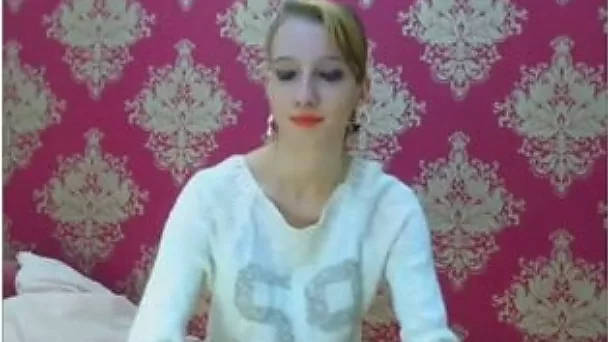 Slim blonde teen teases with her tits and legs in webcam chat