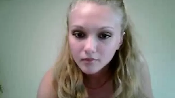Blonde beauty shows her tits on cam and bangs her vag with a dildo
