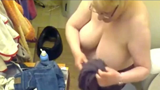 Four eyed granny with fine boobies has no idea she's been filmed