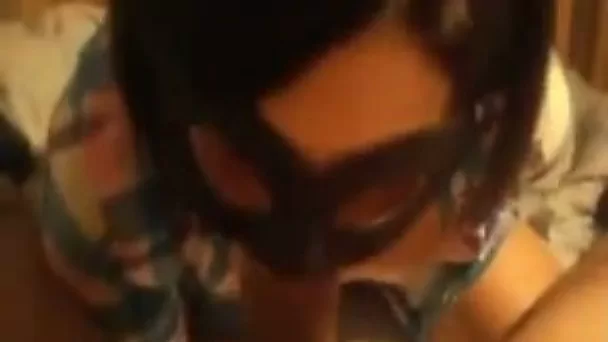 My masked brunette wife favours me with a blowjob and handjob combo