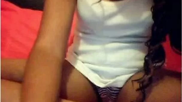 Long-haired beauty shows her body to me and fingers her pussy