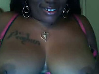 Ebony webcam beauty flashes her big natural tits for five dollars