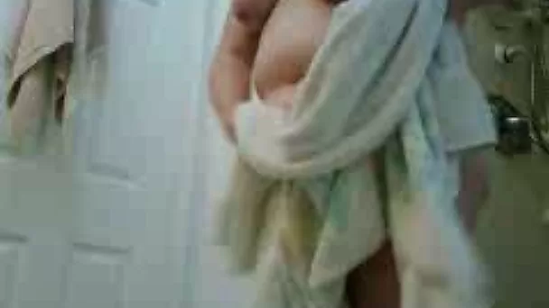 Filthy BBW wife dries her bearded cunt after taking shower - hidden can