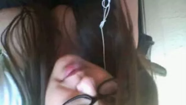 Adorable nerdy Asian webcam babe flirts with me showing her boobs
