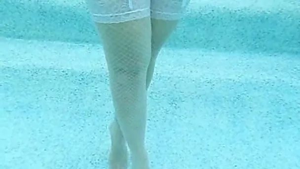 My shy voluptuous blonde MILF wife shows off her rack in pool