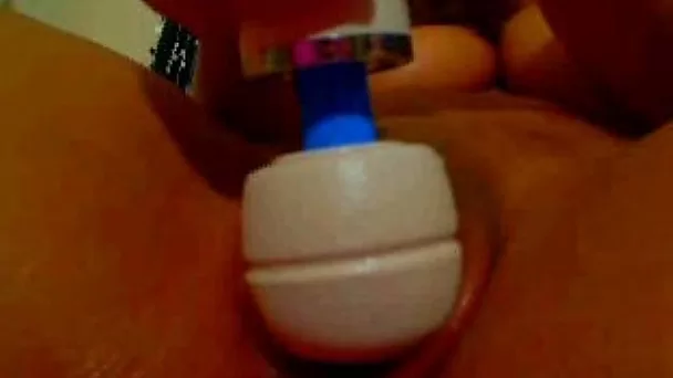 Smoking hot curvaceous ebony webcam sexpot plays with magic wand