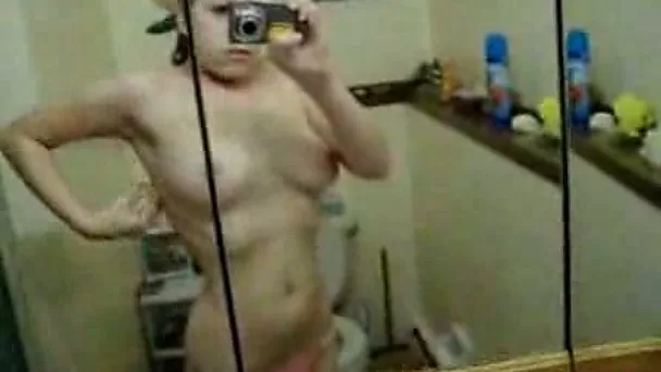 Filming myself stroking my teeny shaved pussy in bathroom home alone