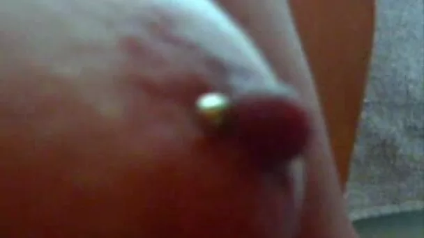 Hot closeup video of my gorgeous bitch's big pink pierced nipples
