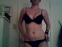 Curvy white brunette stripteases on cam in her room