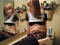 Cute white gingerhead teen flashes her pussy and masturbates in the bathroom