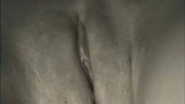 My horny wife entertains herself by fingering her shaved pussy