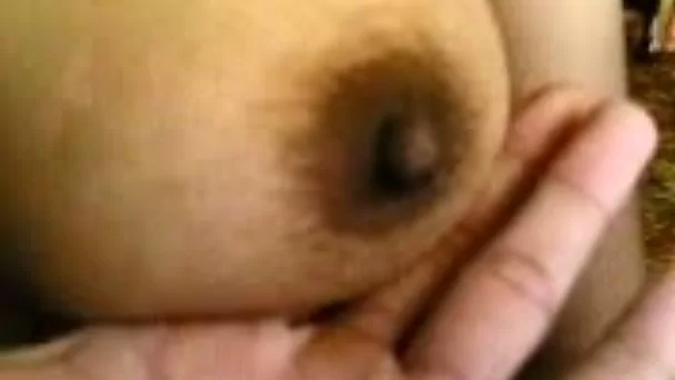 Playful dark skin Malay girlfriend filmed naked in bed