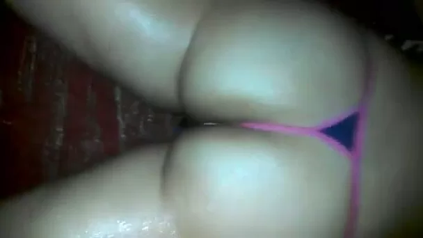 Oiled up beautiful ass of my girlfriend fingered from behind
