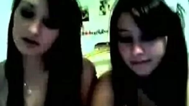 Two cute brunette babes on webcam flashing their goodies