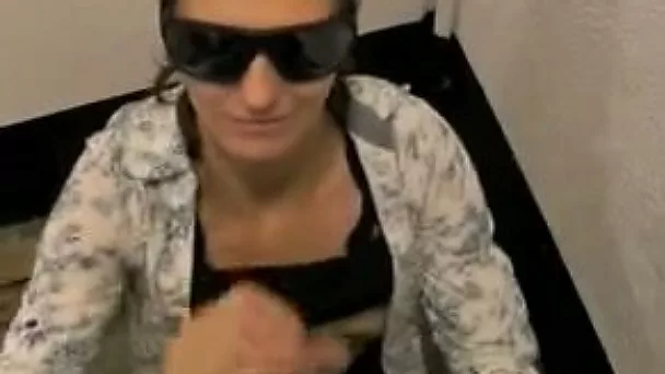 Girlfriend wears black sunglasses and waits to be facialized