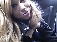 Lubricious teen gal toying her snatch on a back seat in the car