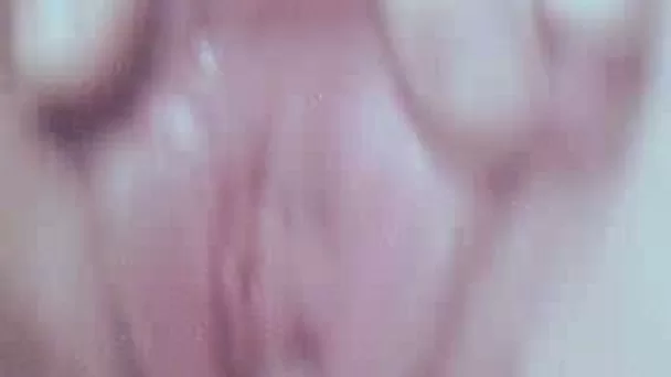 Girlfriend with shaved pink pussy showing off closeup