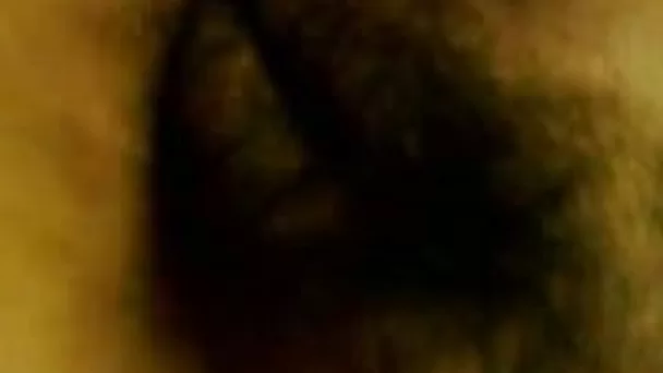 Now that's one hairy pussy of my wife in the bed on cam