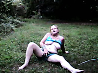 Going wild in the backyard - my chubby redhead gf masturbates outdoors