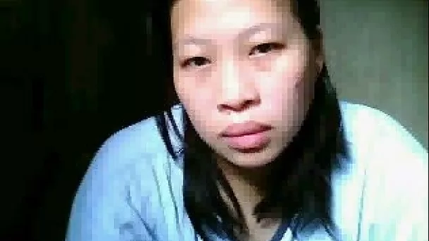 Ugly chunky Asian milf flashes her big tits on the webcam