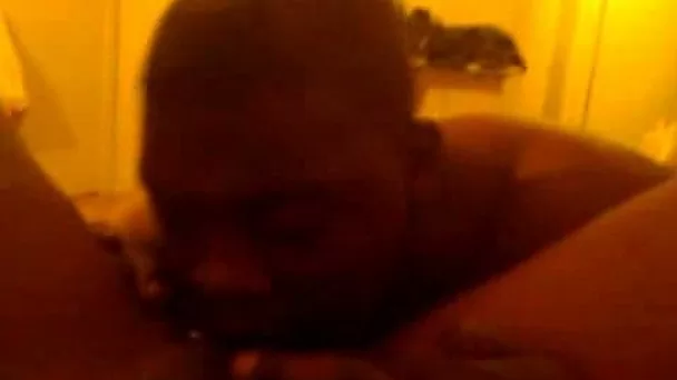 Chubby ebony wife strokes my head with her feet as I eat her wet cunt