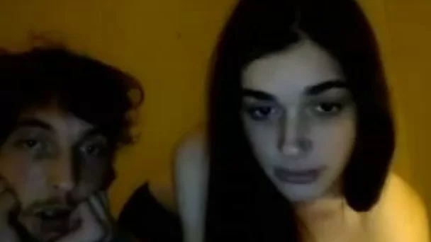 Skinny and cute brunette teen is fed with a dick on webcam