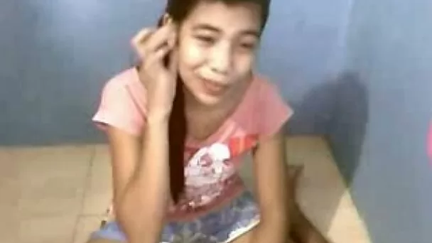 Skinny Fillipina bitch gets naked in front of webcam