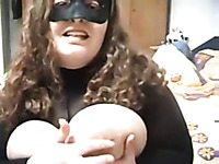 My BBW slut wearing mask is playing with her assets