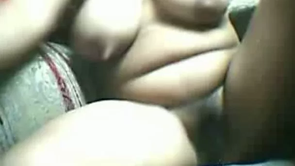 Bosomy and horn-mad amateur brunette nympho poses nude on webcam