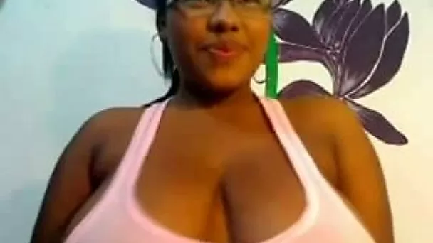 Kinky big breasted amateur black hottie brags of her huge boobies