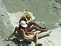 I spy on amateur sunbathing couple fucking outdoors on the bank