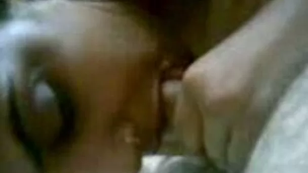 Dirty-minded dark skinned amateur Indian brunette keeps on sucking dick