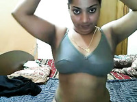Lovely amateur busty Delhi girl undresses on webcam