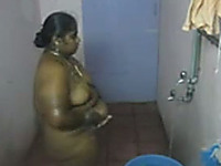 Ugly as hell Indian chubby nympho washes all her fat body in the shower