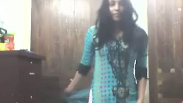 Cute long haired Indian gal shows off in her bright saris