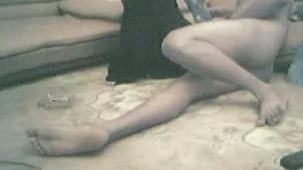 Kinky dude lies on the floor while his coed girlfriend jerks off his dick