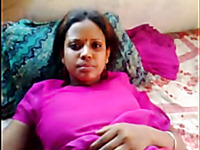 Dark skin authentic amateur Desi lady on the bed filmed