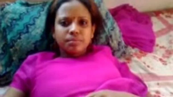 Dark skin authentic amateur Desi lady on the bed filmed