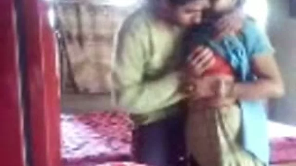 Dark haired amateur Desi wifey in sari provides her hubby with BJ