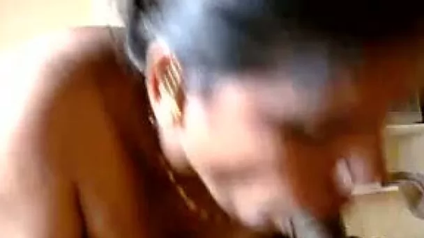 Dark haired mature Indian blowlerina works on her hubby's cock