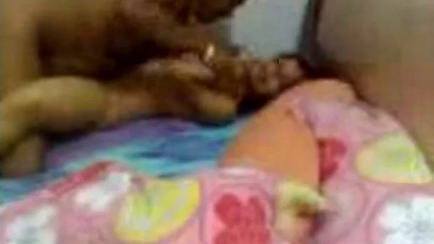 Amateur dark haired Indian wifey lets her hubby spoon her on bed