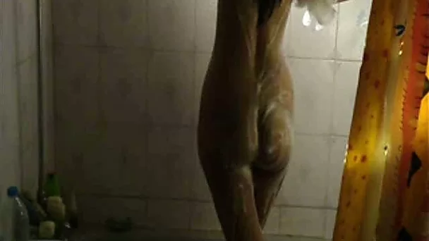 Curvy and hot amateur Indian babe washes in front of camera