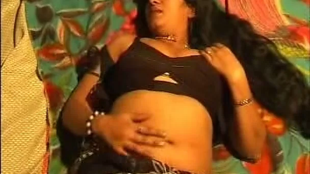 Chunky and passionate dark skin Indian housewfe on cam