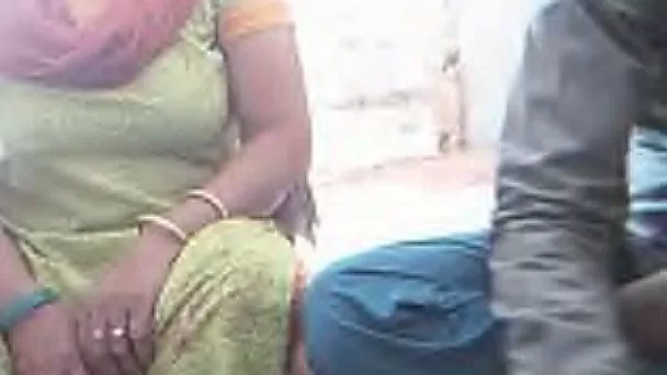 Horny Indian freak shows big tits of his wife on webcam