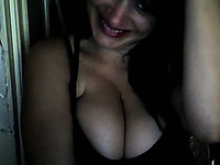 Stunning Russian webcam brunette teases with her big cleavage