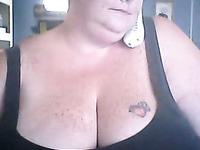 White trash BBW mommy talks with her hubby and shows me her rack
