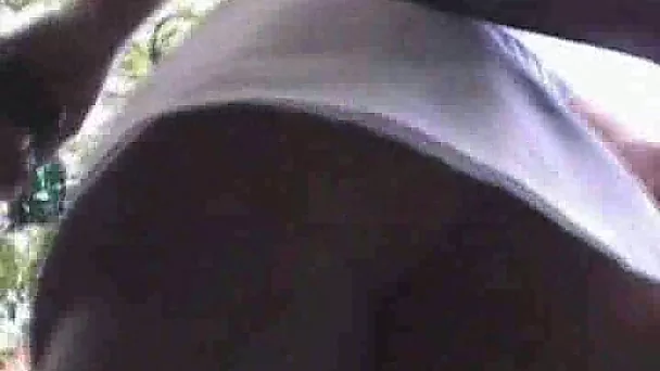 Big ass of my Brazilian wife from upskirt view - outdoors