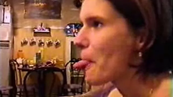 Frisky redhead wife shows off her long tongue and teases me