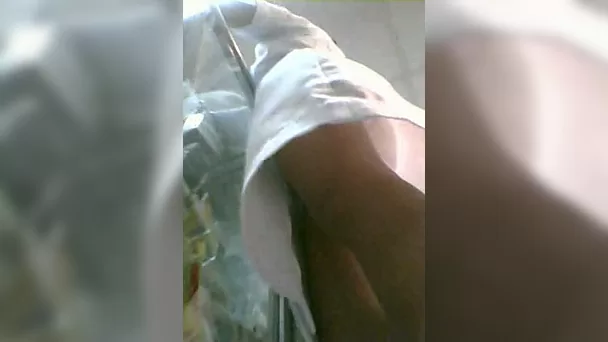 Upskirt view of one cute young nurse at the hospital