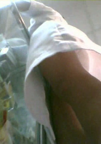 Upskirt view of one cute young nurse at the hospital
